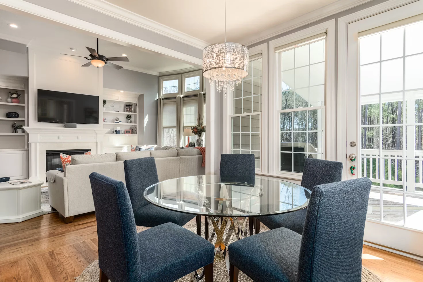 Clean hardwood kitchen and dining area in an Alpharetta home after a recurring visit